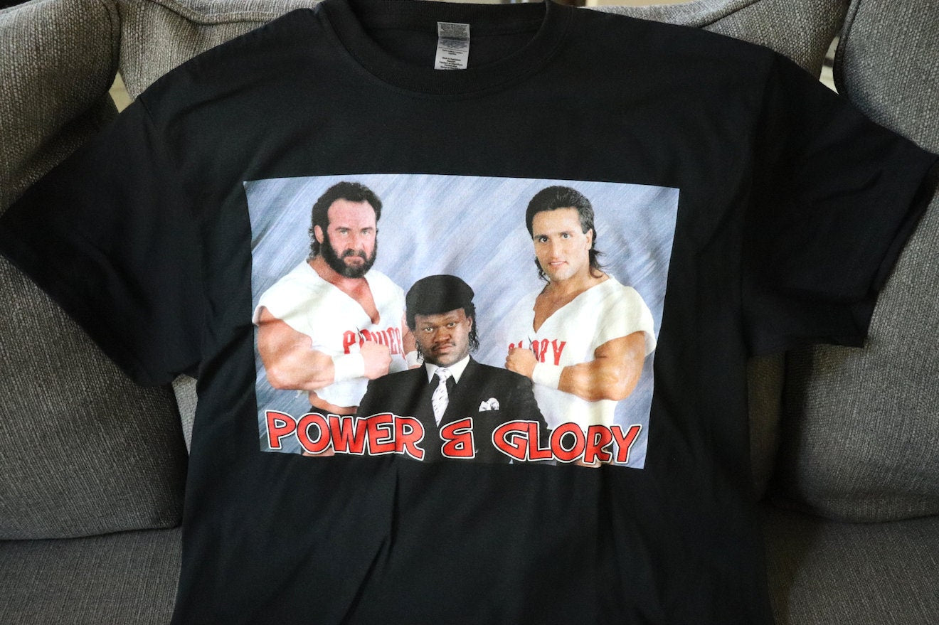 Roma and Herc T-Shirt [Pop Culture - Hulk Hogan - Ric Flair - Randy Savage - Ultimate Warrior - Birthday - Christmas - Secret Santa]