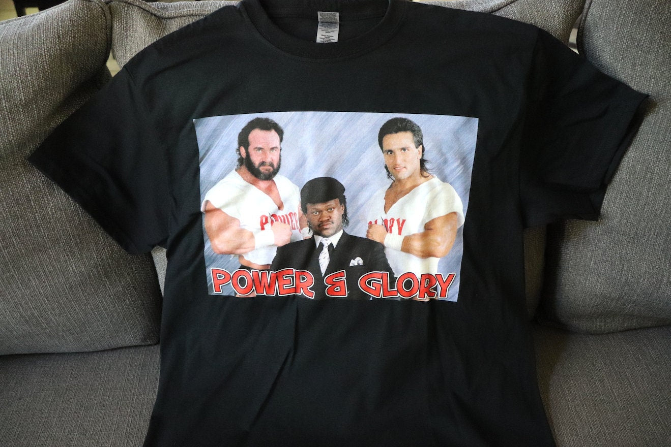 Roma and Herc T-Shirt [Pop Culture - Hulk Hogan - Ric Flair - Randy Savage - Ultimate Warrior - Birthday - Christmas - Secret Santa]