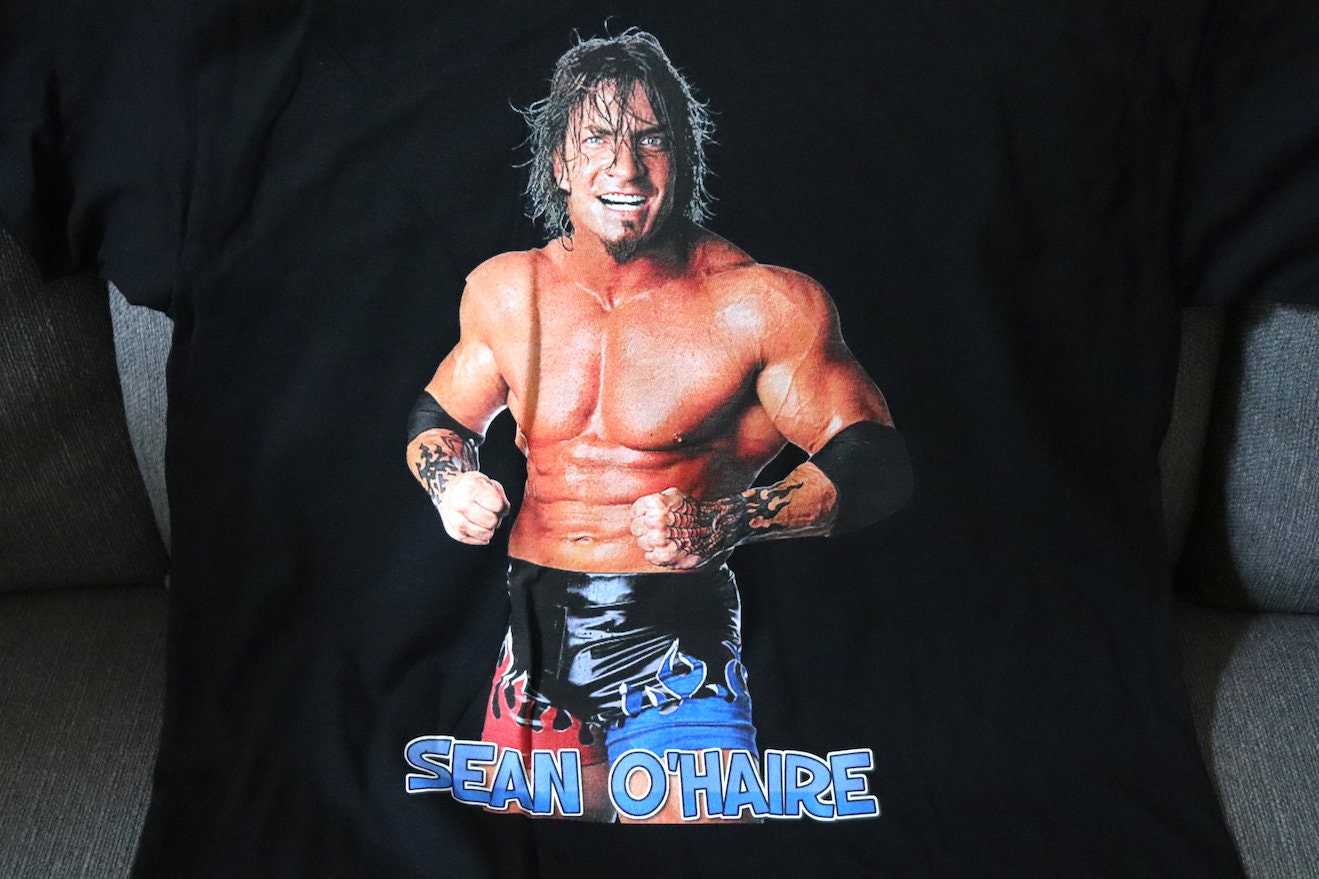 Sean O'Haire T-Shirt [Pop Culture - Hulk Hogan - Ric Flair - Randy Savage - Ultimate Warrior - Birthday - Christmas - Secret Santa]