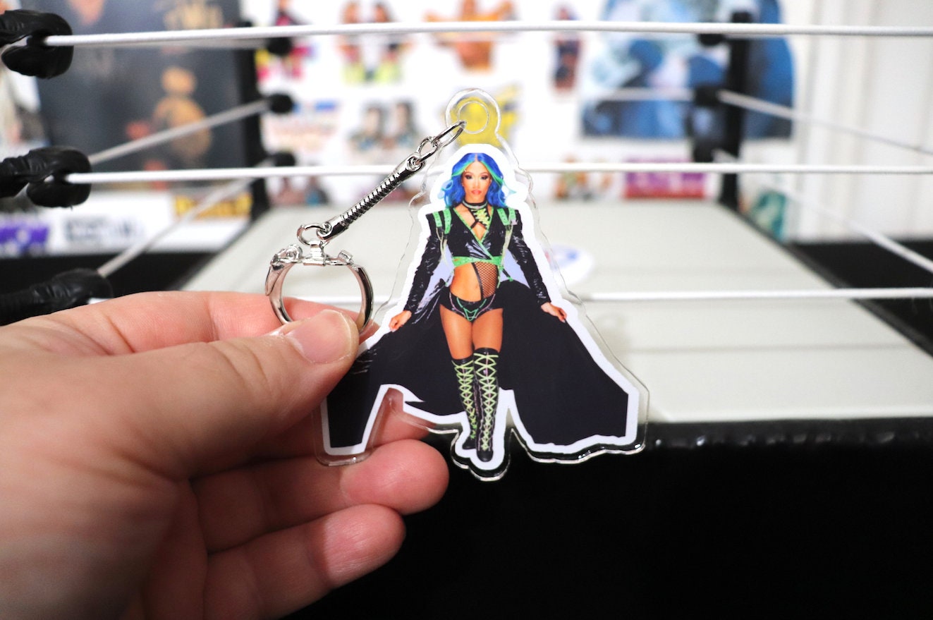 S@sh@ B@nks KeyChain [Wrestling - Hulk Hogan - Ric Flair - Bret Hart - KeyChain - Pop Culture - Gift]